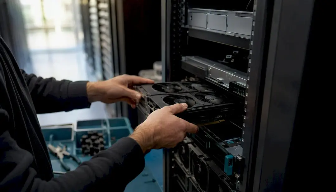 Engineer inspecting enterprise hardware in a UK data centre
